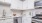 a kitchen with white cabinets