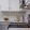 a kitchen with white cabinets